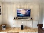 Custom Wall with live wood shelf and Smart TV